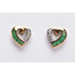A PAIR OF 9CT GOLD EMERALD AND DIAMOND EARRINGS, each designed as an openwork heart to one side