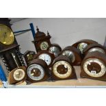 ELEVEN WOODEN CASED CLOCKS, to include Smiths and Chapman chiming mantle oak cased mantle clocks,