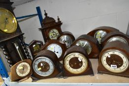 ELEVEN WOODEN CASED CLOCKS, to include Smiths and Chapman chiming mantle oak cased mantle clocks,