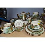 A JAPANESE SOKO-CHINA SIX PLACE TEASET, comprising cups, saucers, side plates, teapot, milk and