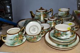 A JAPANESE SOKO-CHINA SIX PLACE TEASET, comprising cups, saucers, side plates, teapot, milk and