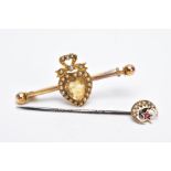 A 9CT GOLD STICK PIN AND A LATE VICTORIAN YELLOW METAL GEMSET BROOCH, the Edwardian stick pin in the