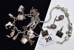 A SMALL QUANTITY OF JEWELLERY, to include two white charm bracelets, the first a silver bracelet
