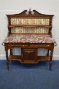 AN EDWARDIAN WALNUT MARBLE TOPPED WASHSTAND, with a floral tile back, two drawers, single cupboard