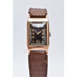A 9CT GOLD RECTANGULAR CASED WRISTWATCH, black dial with gold coloured Arabic numerals and a