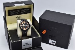 A GENTS 'TW STEEL' WRISTWATCH, black circular dial signed 'TW STEEL, CEO CANTEEN 10ATM', orange