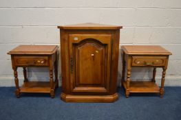 A MODERN CHERRYWOOD SINGLE DOOR CORNER UNIT (key), along with a pair of single drawer lamp tables (