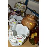 A PAIR OF 19TH CENTURY CONTINENTAL PORCELAIN CACHE POTS, with wavy rims, scrolled side handles and