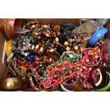 A BOX OF ASSORTED COSTUME JEWELLERY, to include a variety of wooden and plastic bangles, beaded