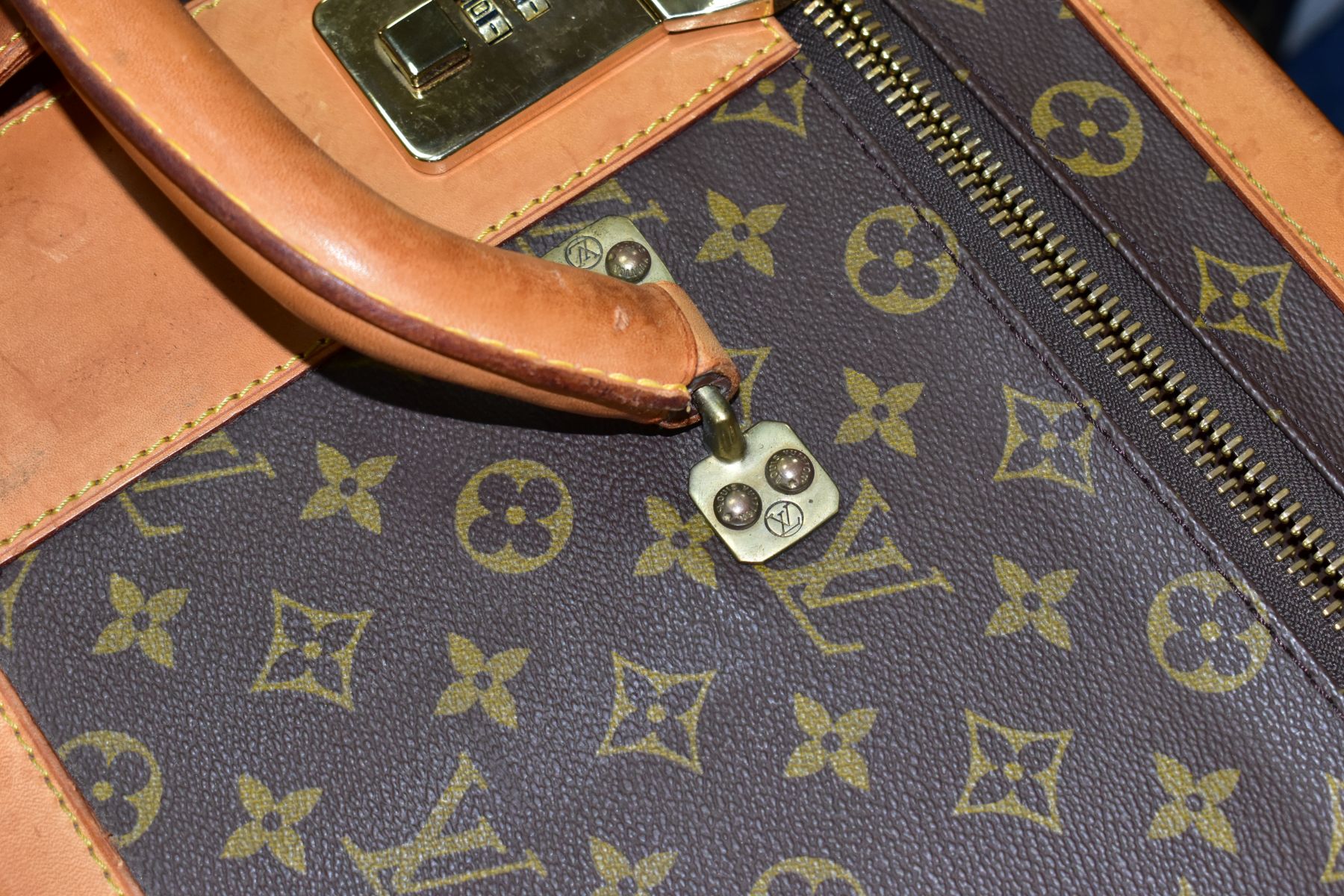 A LOUIS VUITTON MONOGRAM SUITCASE, tan leather trim, with a combination lock (locked, combination - Image 10 of 17