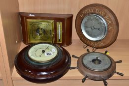 A SHORTLAND SMITH DESK BAROMETER/THERMOMETER AND THREE CIRCULAR FRAMED ANEROID BAROMETERS, including