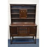 AN 1940'S OAK DRESSER with two drawers, on turned legs united by stretchers, width 127cm x depth