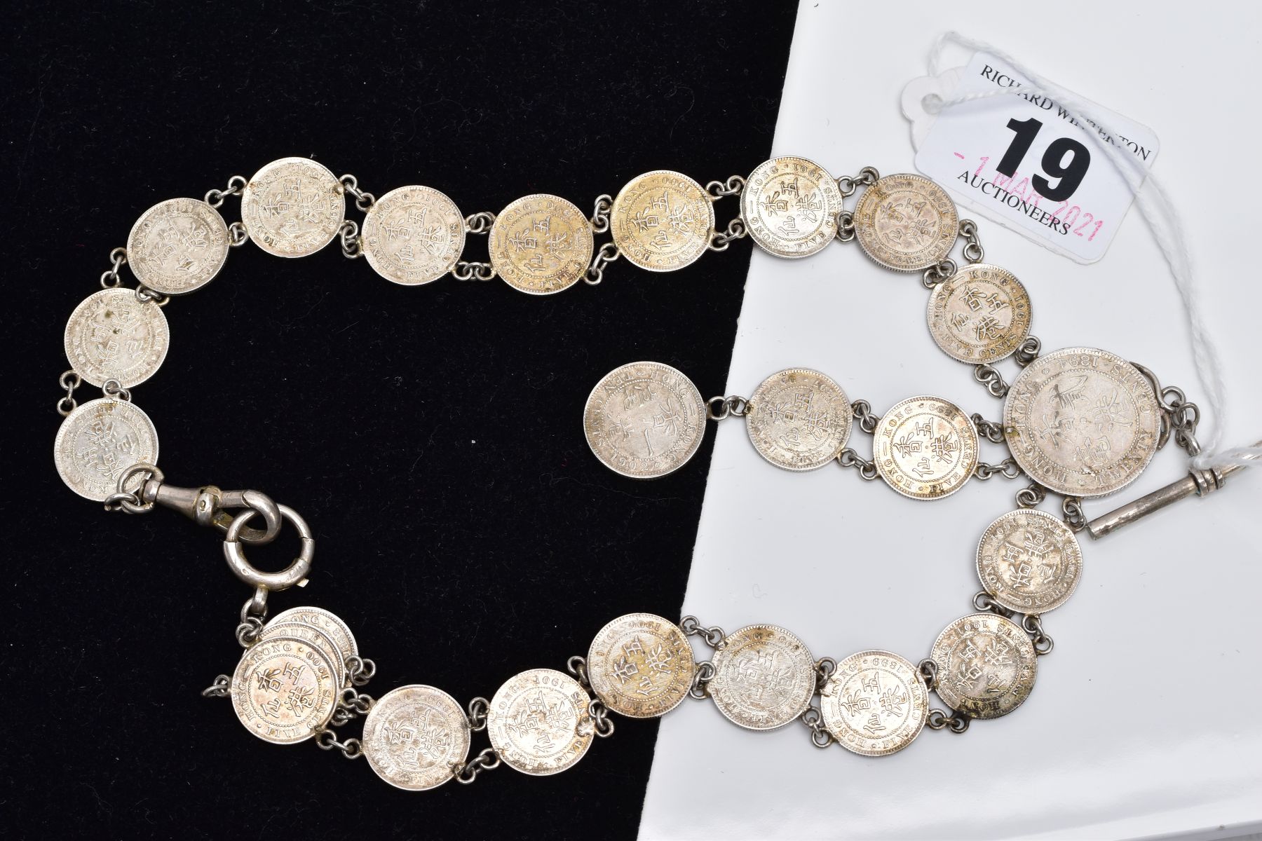 A WHITE METAL COIN NECKLET, made from Queen Victoria Hong Kong five cent coins dating between 1888 -