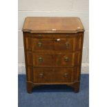 A REPRODUCTION MAHOGANY AND CROSSBANDED CHEST OF THREE GRADUATED DRAWERS, with concave front