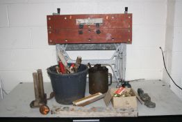 A BLACK AND DECKER WORKMATE, a vintage oil can and a bucket of hand tools including files,