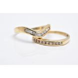 TWO DIAMOND RINGS, to include a 9ct gold wishbone ring set with a row of channel set round brilliant