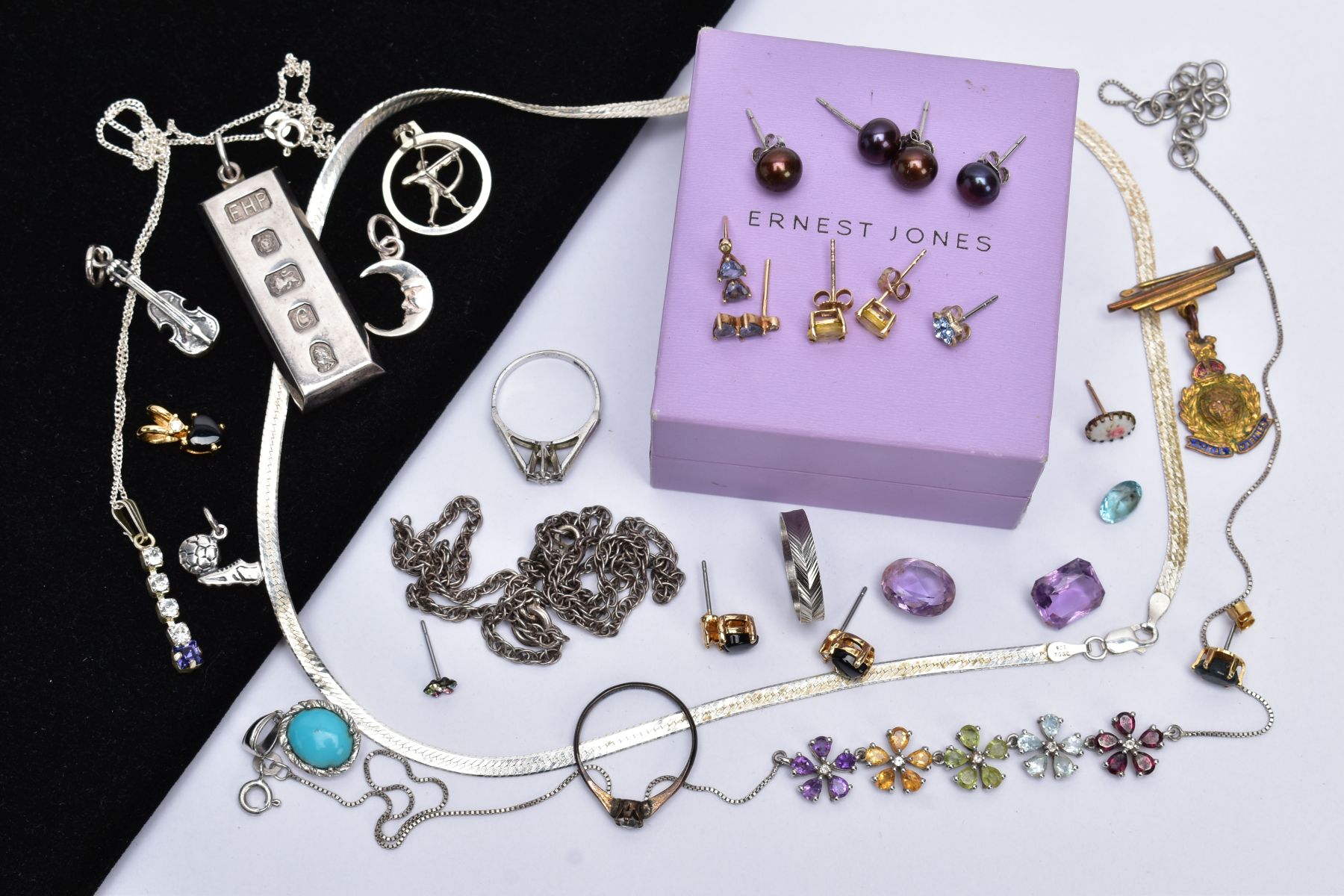 A SELECTION JEWELLERY, to include a pair of stud earrings, each designed with a claw set oval cut