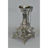 A LATE VICTORIAN/EDWARDIAN SILVER PLATED CENTREPIECE BASE, cast with four dragons below the beaded