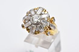 A YELLOW METAL DIAMOND CLUSTER RING, large cluster set with a central round transitional cut
