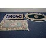 A G H FRITH CHINESE WOOLLEN GREEN GROUND OVAL RUG, 194cm x 127cm, and two smaller rectangular