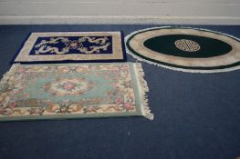 A G H FRITH CHINESE WOOLLEN GREEN GROUND OVAL RUG, 194cm x 127cm, and two smaller rectangular