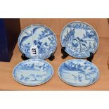FOUR EARLY 18TH CENTURY CHINESE BLUE AND WHITE PORCELAIN SAUCERS FROM THE CA MAU WRECK, all four