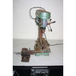 AN UNBRANDED PILLAR DRILL 59cm high with a standard machine vice and a two axis machine vice with