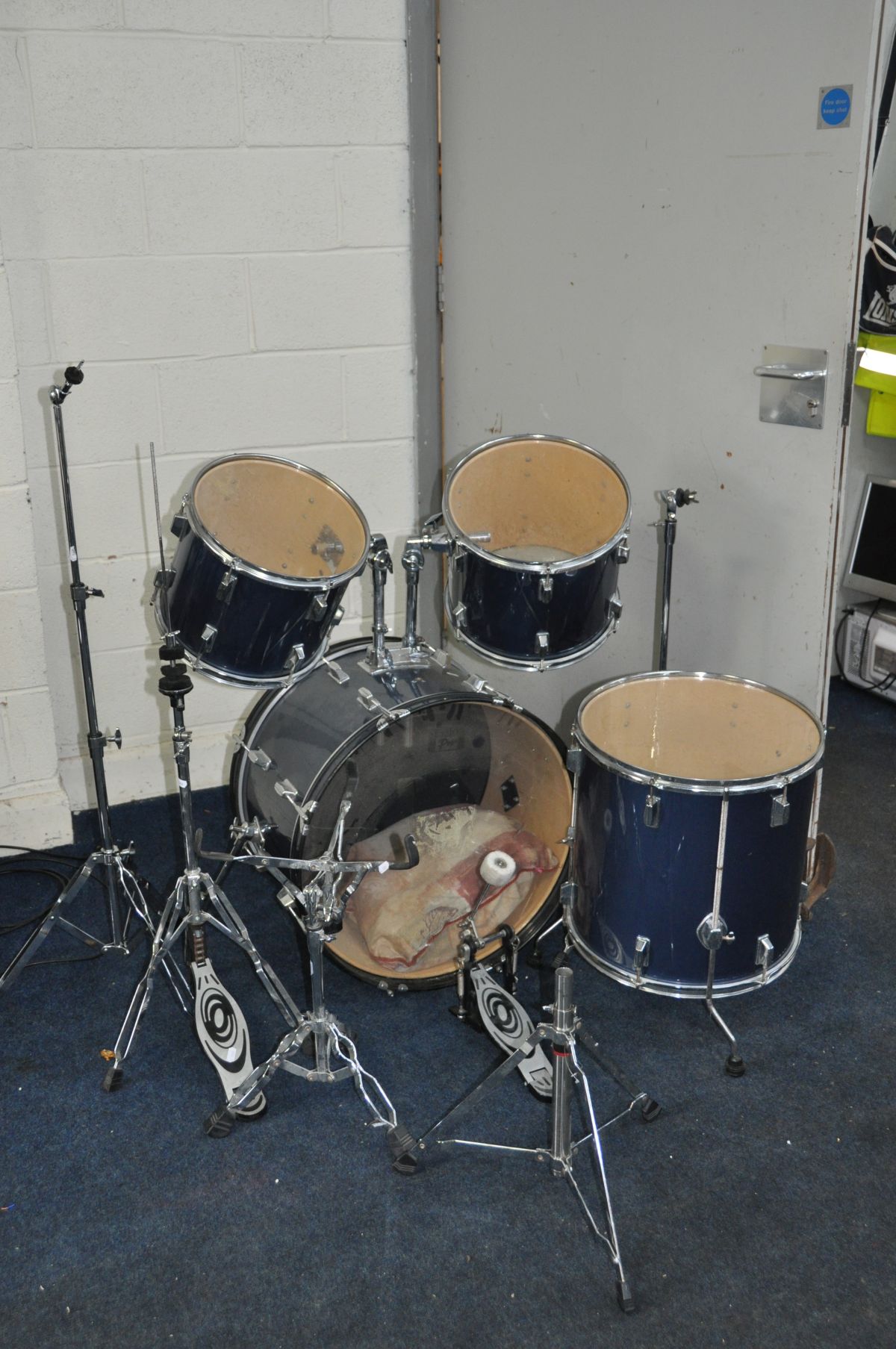 A PERCUSSION PLUS FOUR PIECE DRUM KIT including a 22x14 inch kick, 16x16 inch floor, a 13x11 inch