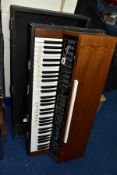 A 1970'S LOGAN ELECTRONIC PIANO STRING SYNTHESIZER in wooden case, serial no. 9720 (untested)