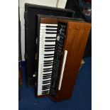 A 1970'S LOGAN ELECTRONIC PIANO STRING SYNTHESIZER in wooden case, serial no. 9720 (untested)