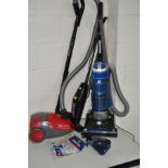 A HOOVER BLAZE UPRIGHT VACUUM with bags and accessories together with a dirt devil 1400 watt