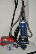 A HOOVER BLAZE UPRIGHT VACUUM with bags and accessories together with a dirt devil 1400 watt