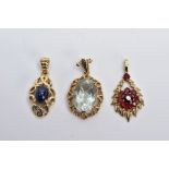 THREE 9CT GOLD GEM SET PENDANTS, the first of an oval form, set with a claw set oval cut quartz,