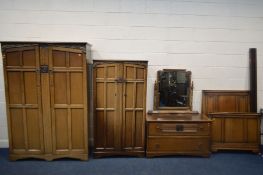 AN OAK FIVE PIECE BEDROOM SUITE, comprising a double door wardrobe, width 128cm x depth 58cm x