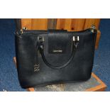 A CALVIN KLEIN BLACK LEATHER HANDBAG, fitted with detachable shoulder strap, carry handles, over the