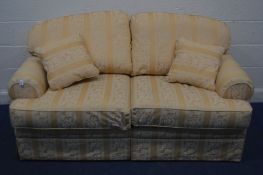 A REYLON UPHOLSTERED TWO SEATER SOFABED, width 182cm