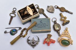 A COLLECTION OF POCKET WATCH KEYS, gold plated fobs and jewellery items to include a Charles