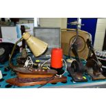 A GROUP OF LAMPS, RADIOS, PAPER EMBOSSERS, etc, including a wooden boat shaped lamp, a Bush radio, a