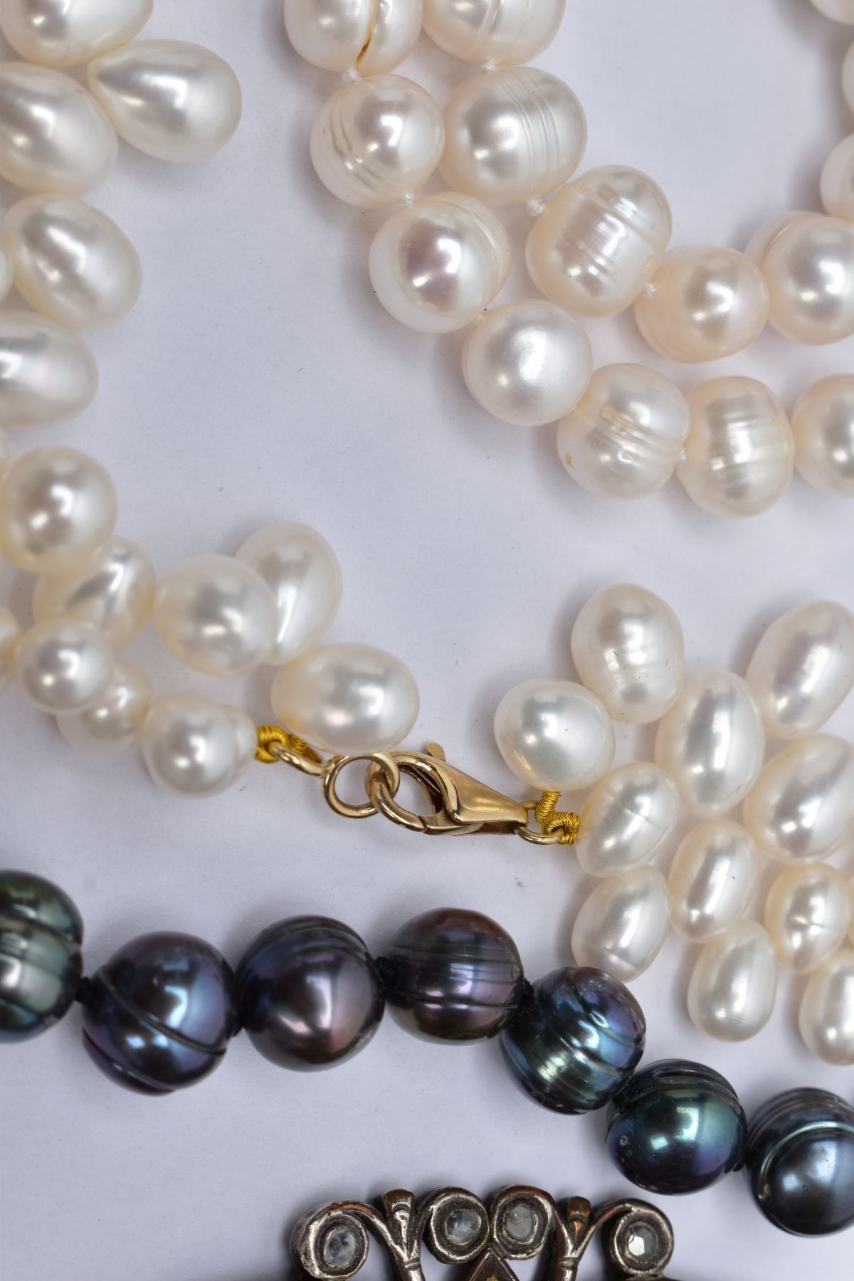 TWO CULTURED FRESHWATER PEARL NECKLACES, A TAHITIAN PEARL NECKLACE AND A WHITE METAL BUCKLE, the - Image 3 of 5