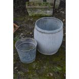 A GALVANISED CORRUGATED DOLLY TUB, diameter 41cm x height 48cm together with a galvanised bucket (