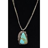 A WHITE METAL TURQUOISE PENDANT NECKLET, the pendant set with a triangular shaped turquoise cabochon