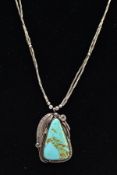 A WHITE METAL TURQUOISE PENDANT NECKLET, the pendant set with a triangular shaped turquoise cabochon