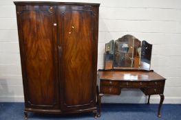 A MAHOGANY TWO PIECE BEDROOM SUITE, comprising a bowfront double door wardrobe, width 126cm x