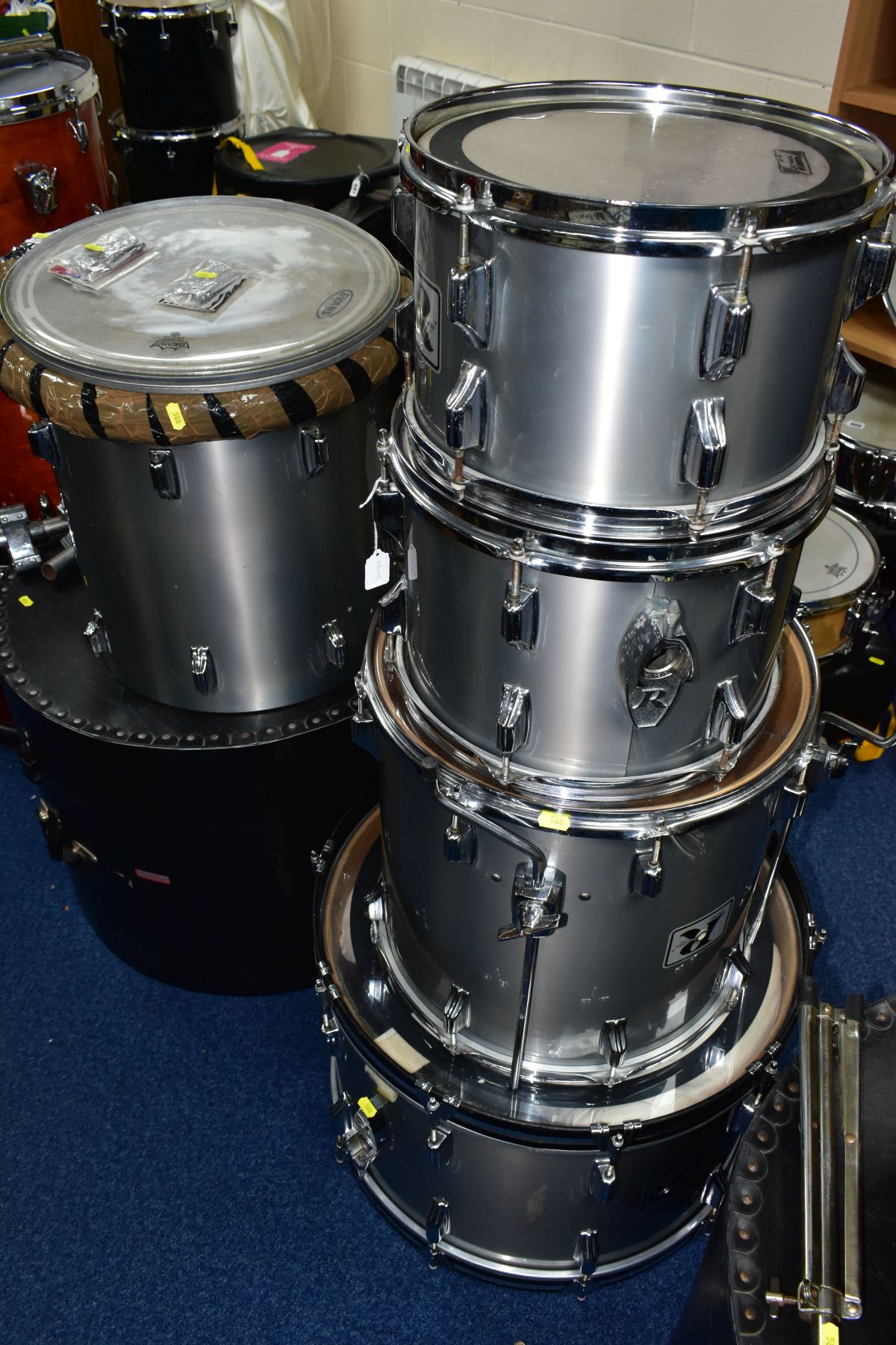 A ROGERS RX8 FIVE SHELL DRUM KIT, in smoke grey with a set of LeBlond fibre cases comprising a 22