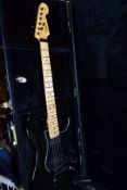 A JAMIE DAVEY SUPER STRAT in black and maple, two piece neck and fingerboard with Fender USA 1984