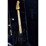 A JAMIE DAVEY SUPER STRAT in black and maple, two piece neck and fingerboard with Fender USA 1984