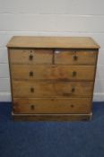 A VICTORIAN PINE CHEST OF TWO OVER THREE LONG DRAWERS, with gothic drop handles, width 107cm x depth