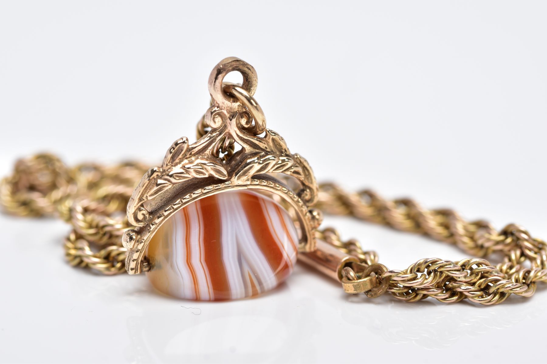 A 9CT GOLD SWIVEL AGATE FOB PENDANT NECKLACE, the fob designed with a polished white and orange - Image 2 of 3