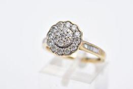 A 9CT GOLD DIAMOND CLUSTER RING, of a raised flower design, set with round brilliant cut diamonds,