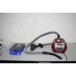 A HOOVER SPRINT VACUUM CLEANER (PAT pass and working but cable return not recoiling) and a